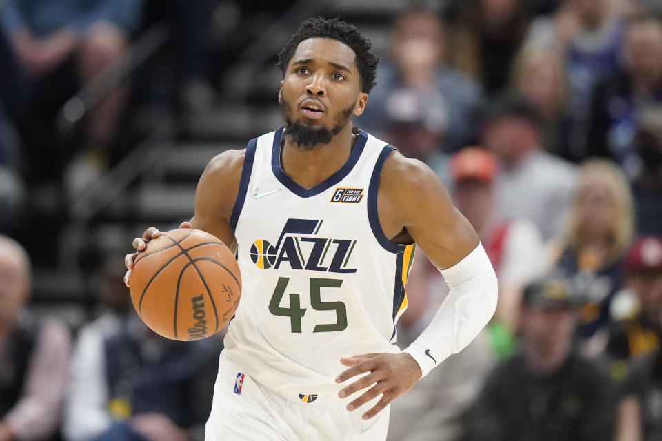 Utah Jazz guard Donovan Mitchell (45) brings the ball upcourt against the Milwaukee Bucks during the first half of an NBA basketball game Monday, March 14, 2022, in Salt Lake City. (AP Photo/Rick Bowmer)