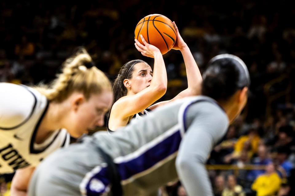 Iowa guard Caitlin Clark (22) shoots a free throw during NCAA women's basketball game against Kansas State, Thursday, Nov. 16, 2023, at Carver-Hawkeye Arena in Iowa City, Iowa.