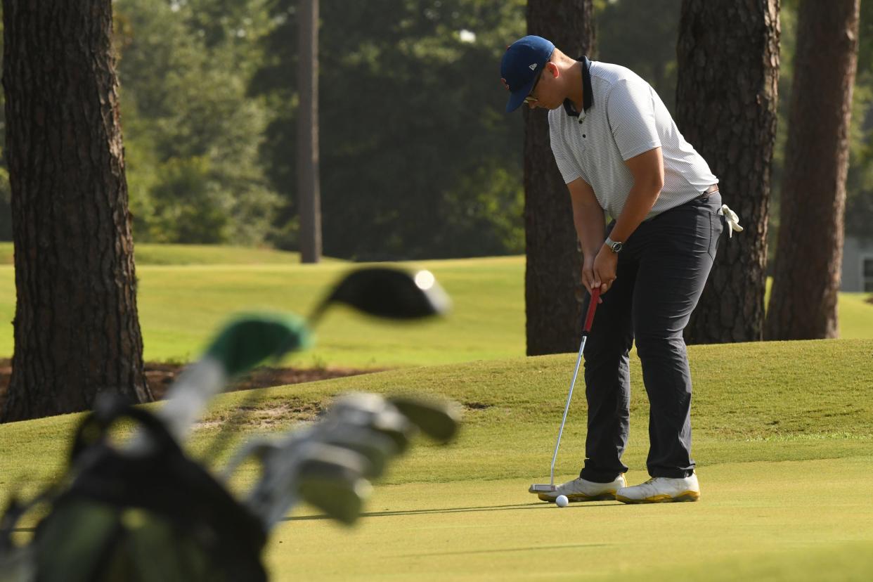 Bryan Johnson putts on the first hole during the Wilmington-City Am golf tournament at the Wilmington Municipal Golf Course on Saturday, Aug. 28, 2021. This is just one of the many golf courses you will find in the Wilmington area.