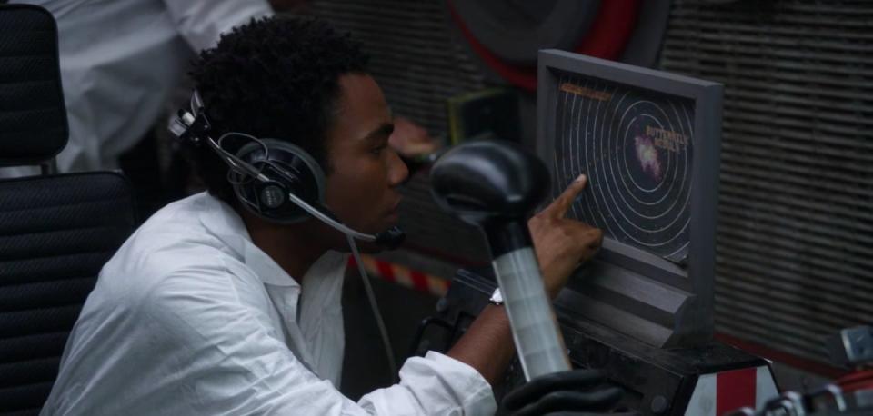 Troy looking at a fake radar screen in "Community"