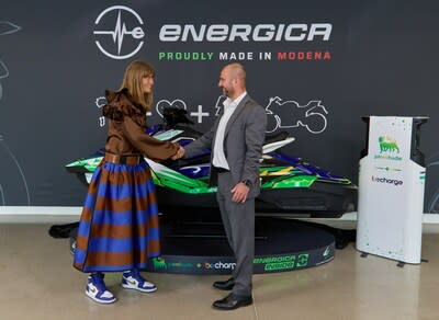 Energica CEO Livia (left) in front of electric watercraft