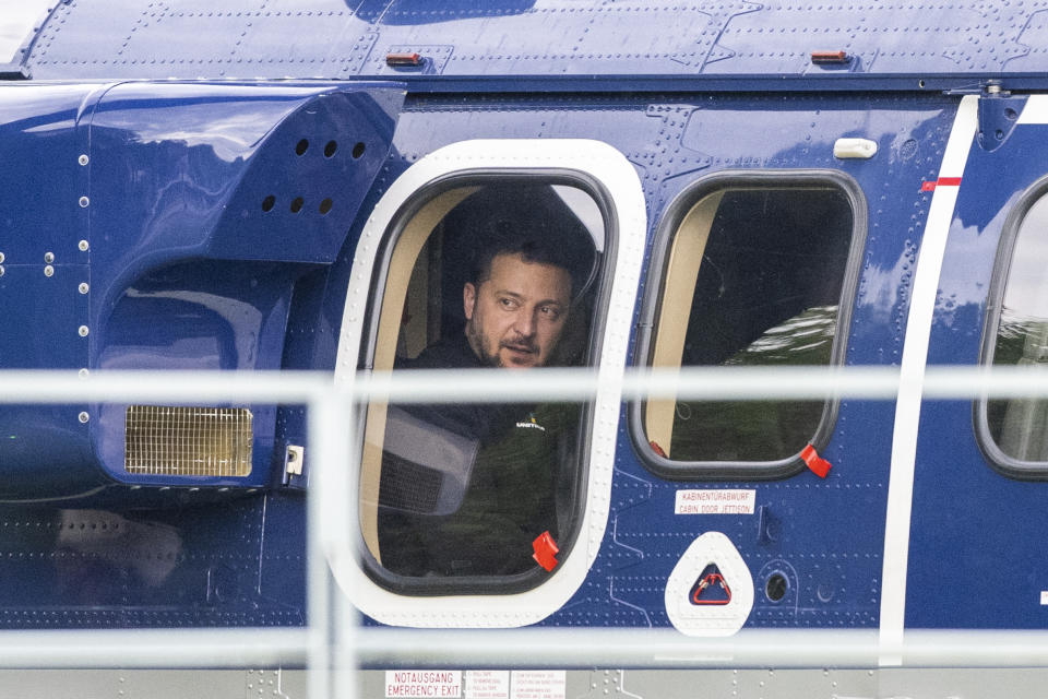 FILE - Ukrainian President Volodymyr Zelenskyy, sits in a Federal Police helicopter after talks with Chancellor Olaf Scholz in Berlin, Germany, Sunday, May 14, 2023. While the world awaits Ukraine's spring offensive, its leader Volodymyr Zelenskyy has already launched a diplomatic one. In a span of a week, he has dashed to Italy, the Vatican, Germany, France and Britain to shore up support for the defense of his country. On Friday, May 19, 2023, he was in Saudi Arabia to meet with Arab leaders, some of whom are allies with Moscow. (Christophe Gateau/dpa via AP)