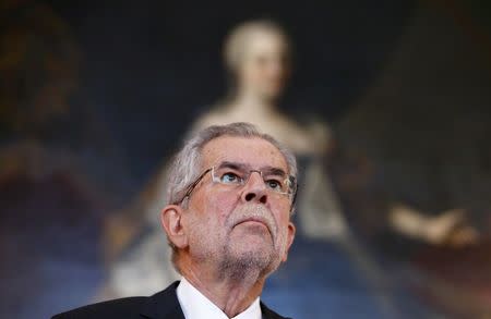 Austrian President-elect Alexander Van der Bellen looks up during a meeting with President Heinz Fischer (unseen) in Vienna, Austria, May 24, 2016. REUTERS/Leonhard Foeger