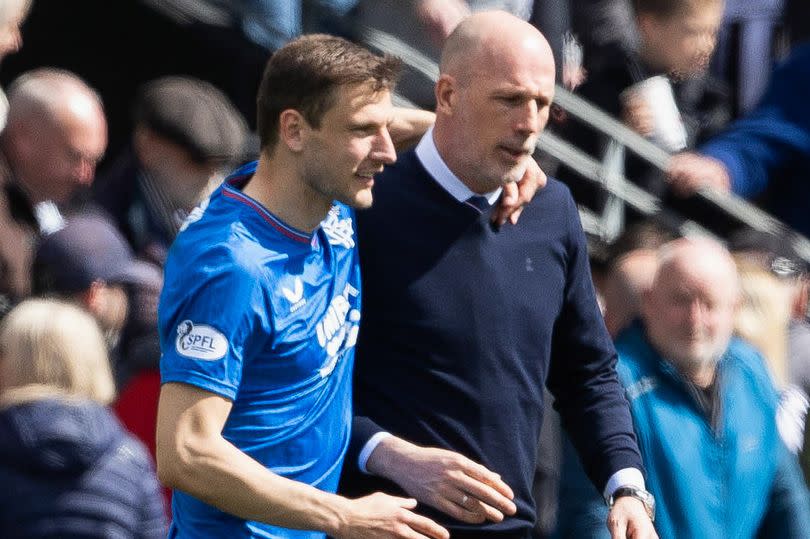 Borna Barisic embraces Philippe Clement at full-time against St Mirren