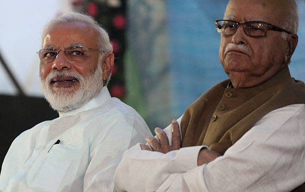 File: Indian prime minister Narendra Modi  and  Lal Krishna Advani attend the party’s national executive meeting in Allahabad on 12 June 2016 (AFP via Getty Images)