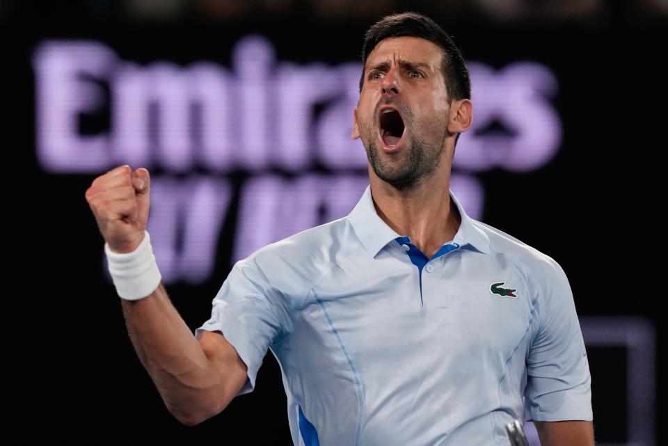 Serbia's Novak Djokovic celebrates after winning the third set against Croatia's Dino Prizmic during their first round match at the Australian Open.