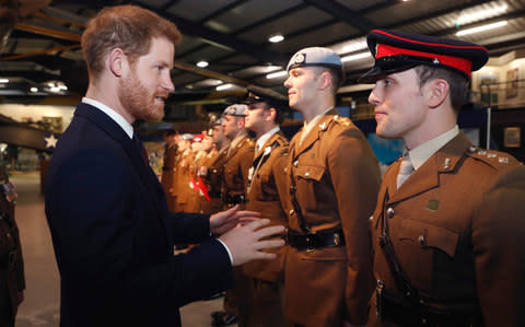 Prince Harry talks as he visits the Army Aviation Centre  - Credit:  Heathcliff O'Malley