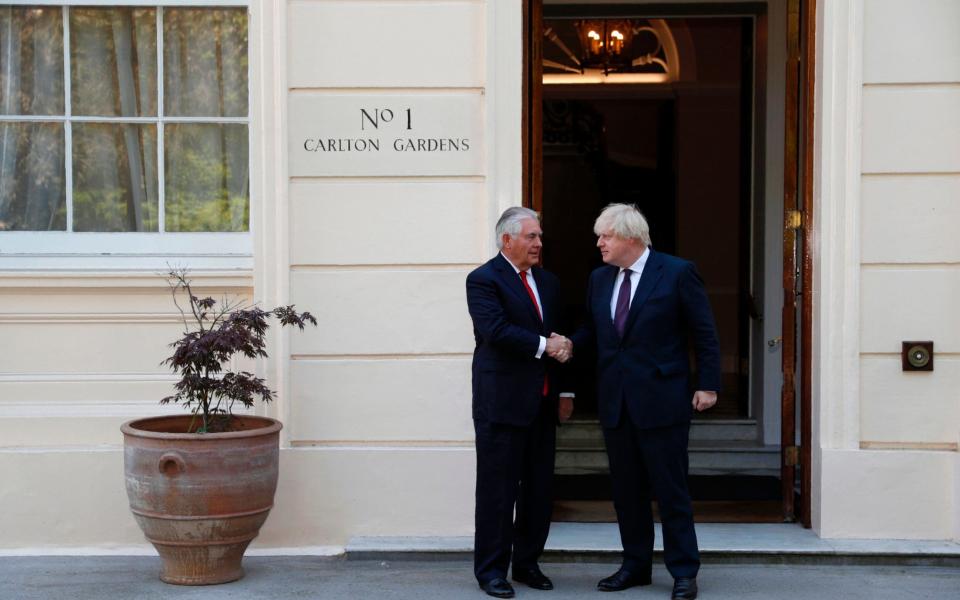 At last! The pair shake hands outside Carlton Gardens - Credit: ADRIAN DENNIS/AFP