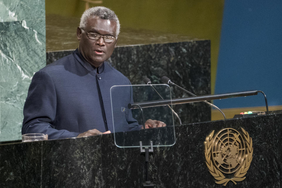 FILE - Manasseh Sogavare, Prime Minister of Solomon Islands, addresses the United Nations General Assembly, Friday, Sept. 22, 2017, at U.N. headquarters. Solomon Islands Prime Minister Sogavare has blamed foreign interference over his government's decision to switch alliances from Taiwan to Beijing for anti-government protests, arson and looting that have ravaged the capital in recent days. (AP Photo/Craig Ruttle, File)