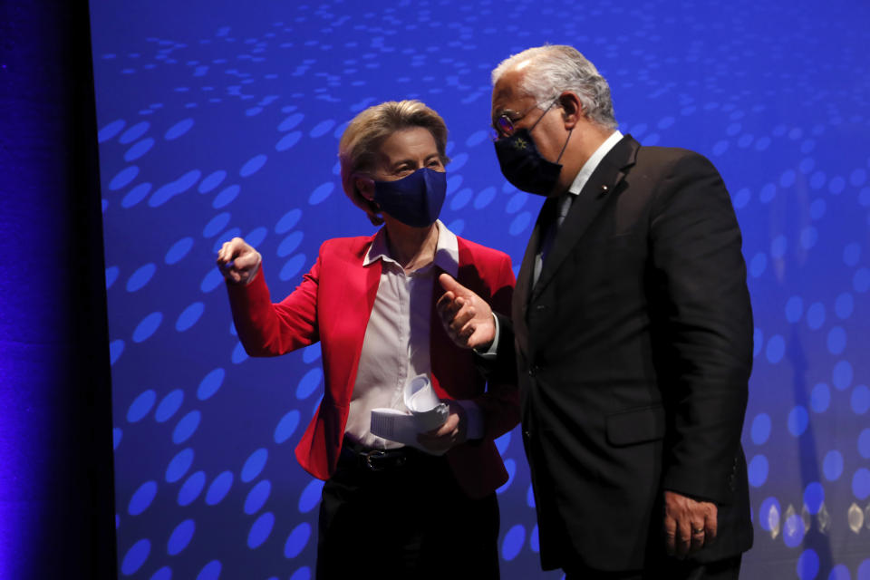 European Commission President Ursula Von Der Leyenchats with Portuguese Prime Minister Antonio Costa at the end of their joint news conference at the Belem Cultural Center in Lisbon, Friday, Jan. 15, 2021. The Portuguese presidency of the EU is receiving the College of Commissioners of the European Commission for a round of meetings. (AP Photo/Armando Franca)