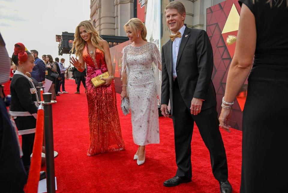 Gracie Hunt, Tavia and Clark Hunt, right, Chairman and CEO of the Kansas City Chiefs arrived at Union Station and greeted Taylen Biggs, far left, a social media star, as they walked the red carpet on their way to the team’s Super Bowl LVII championship ring ceremony Thursday, June 15, 2023, in Kansas City.