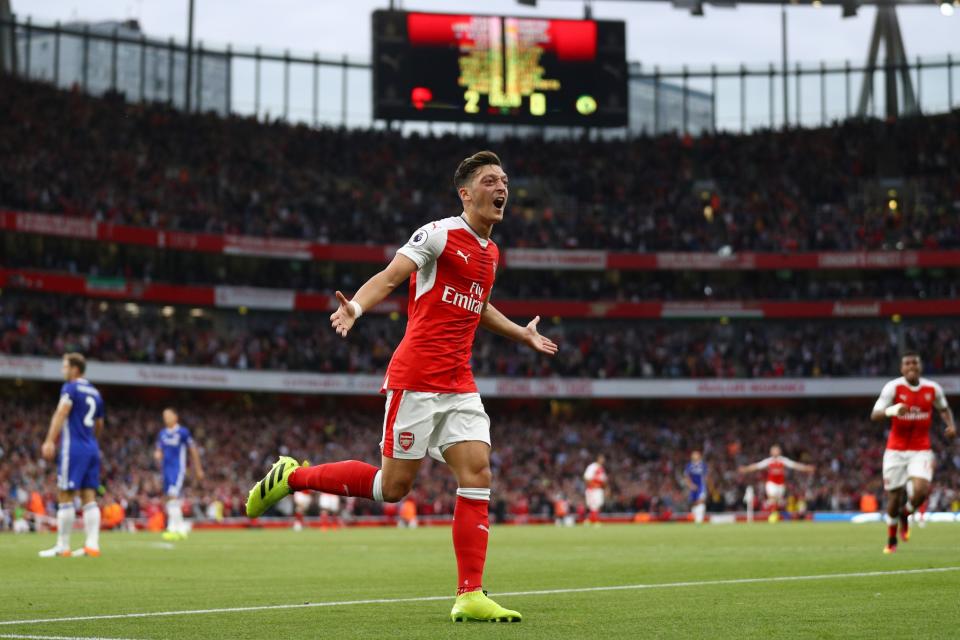 As good as it got: Mesut Ozil celebrates scoring Arsenal's third against Chelsea