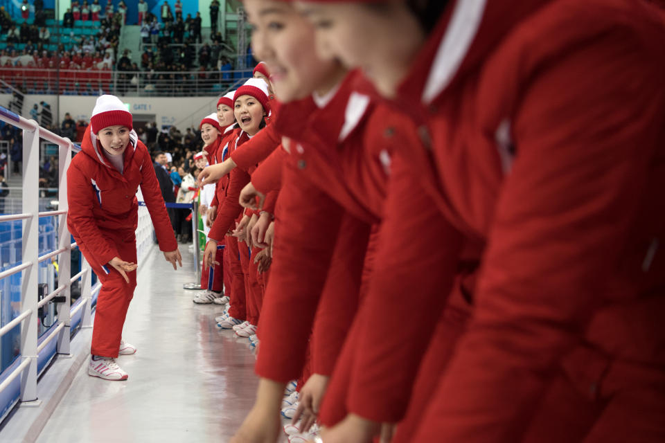 <p>North Korean cheerleaders perform during the Women’s Ice Hockey Preliminary Round, Group B match between North Korea and Switzerland on day one of the PyeongChang 2018 Winter Olympic Games at Kwandong Hockey Centre on February 10, 2018 in Gangneung, South Korea. (Photo by Carl Court/Getty Images) </p>