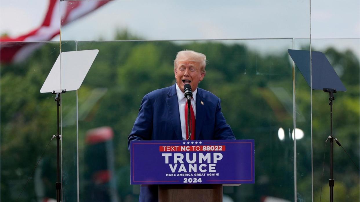 PHOTO: Republican presidential nominee former President Donald Trump speaks during a campaign rally at North Carolina Aviation Museum, Aug. 21, 2024, in Asheboro, N.C. (Julia Nikhinson/AP)