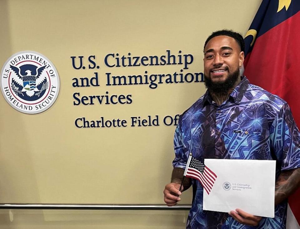 Panthers linebacker Frankie Luvu celebrates his American citizenship at a ceremony in Charlotte in August 2023.