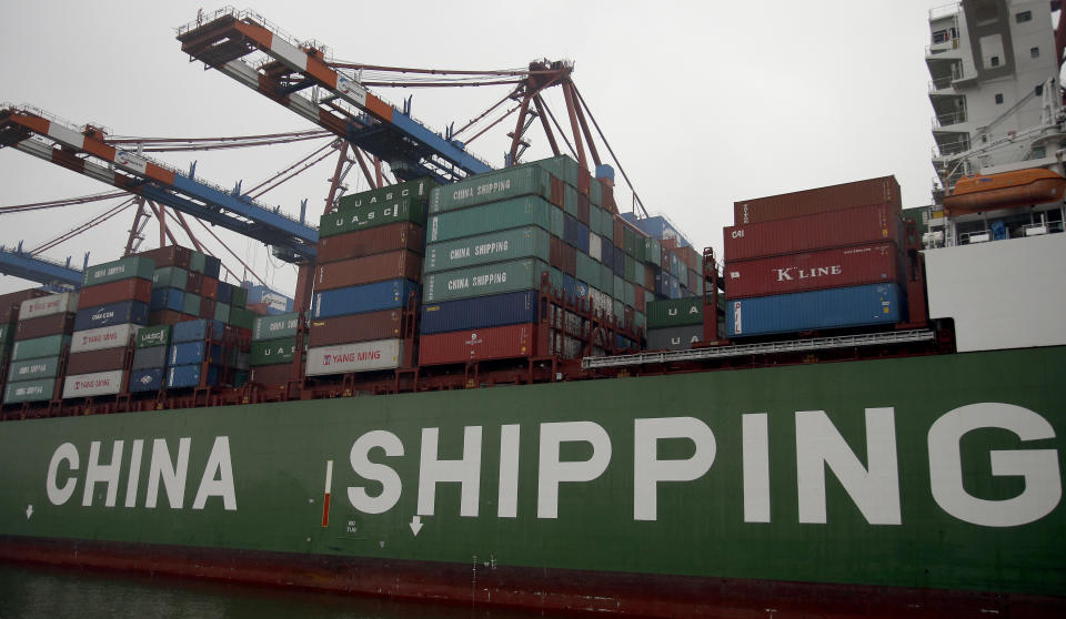 Containers are pictured on board of the 'Star' vessel of the China Shipping Container Lines shipping company at the harbour in Hamburg, Germany, Wednesday, Oct. 29, 2014. Germany's Chancellor Angela Merkel wants to preserve trade and cooperation on global warming but has warned of possible consequences if the security law that will tighten Beijing’s control over Hong Kong goes ahead. “China is an important partner for us but also a competitor,” said Foreign Minister Heiko Maas in a statement on Friday, July 24, 2020, after a videoconference with his Chinese counterpart, Wang Yi. (AP Photo/Michael Sohn, File)