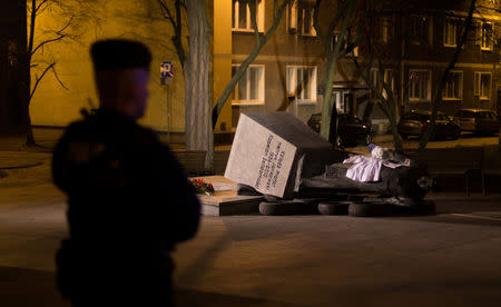 The monument of the late priest Henryk Jankowski is seen after it was pulled down by activists in Gdansk, Poland February 21, 2019. Agencja Gazeta/Bartek Sabela via REUTERS