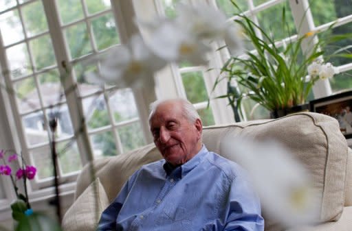 British 1948 Olympian Lionel Price is pictured at his home in London, on July 31, 2012. Price, 85, is the last surviving member of Great Britain's 1948 Olympic basketball team