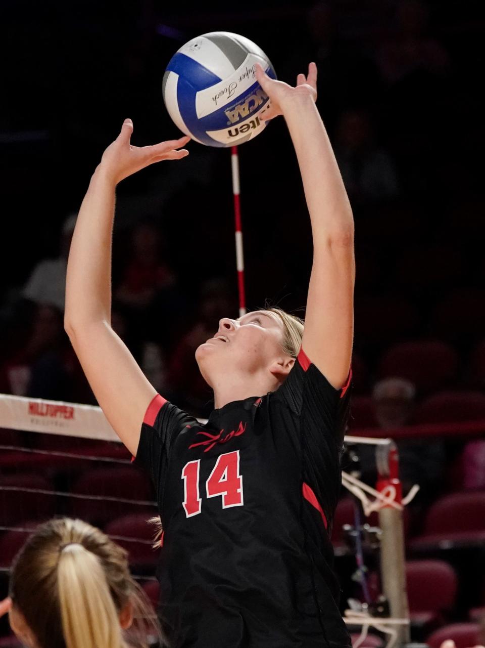 Setter Callie Bauer (14) of the Hilltoppers during a game at E.A Diddle Arena on October 29, 2022 in Bowling Green, KY. Photo by Wyatt Richardson/WKU Athletics