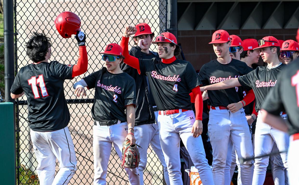Anthony DiGiacomo celebrates with Barnstable teammates after scoring the first run in a 7-1 win over Bridgewater-Raynham.