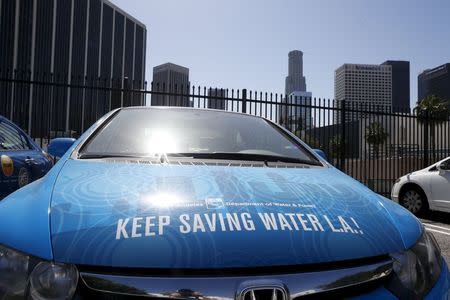 A Department of Water and Power (DWP) Water Conservation Response Unit car, that patrols the streets looking for people wasting water during the drought, is seen in Los Angeles, California April 17, 2015. REUTERS/Lucy Nicholson