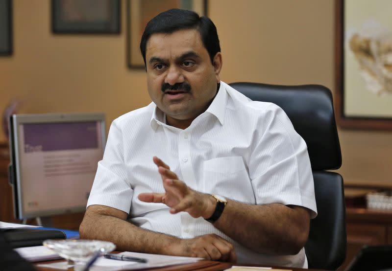 FILE PHOTO: Indian billionaire Adani speaks during an interview with Reuters at his office in Ahmedabad