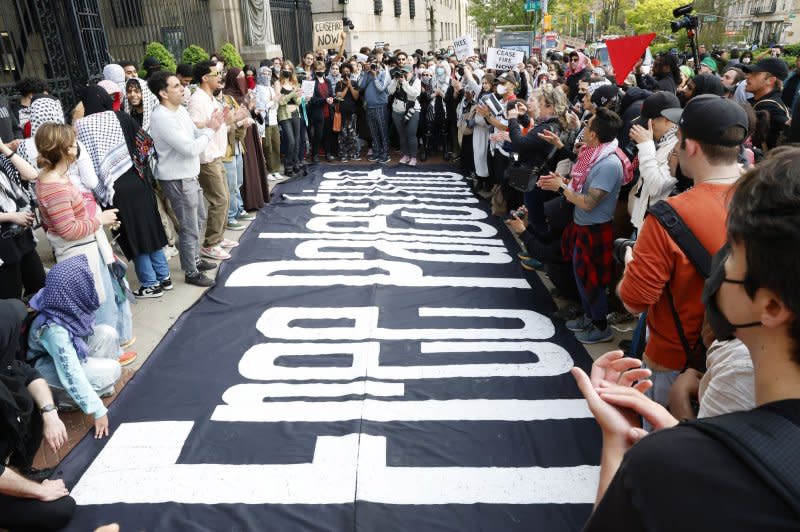 Pro-Palestine protesters gather in front of the Broadway entrance of New York City's Columbia University on Tuesday as protests have continued for almost 2 weeks on the school's campus. It is not clear yet how many of the 282 arrested Tuesday night were actually students of the 109 taken into custody on the Columbia campus and 173 at CUNY. Photo by John Angelillo/UPI