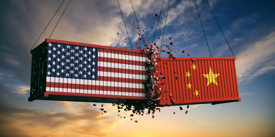 Two shipping containers, each labeled with the U.S. and China flags, collide.