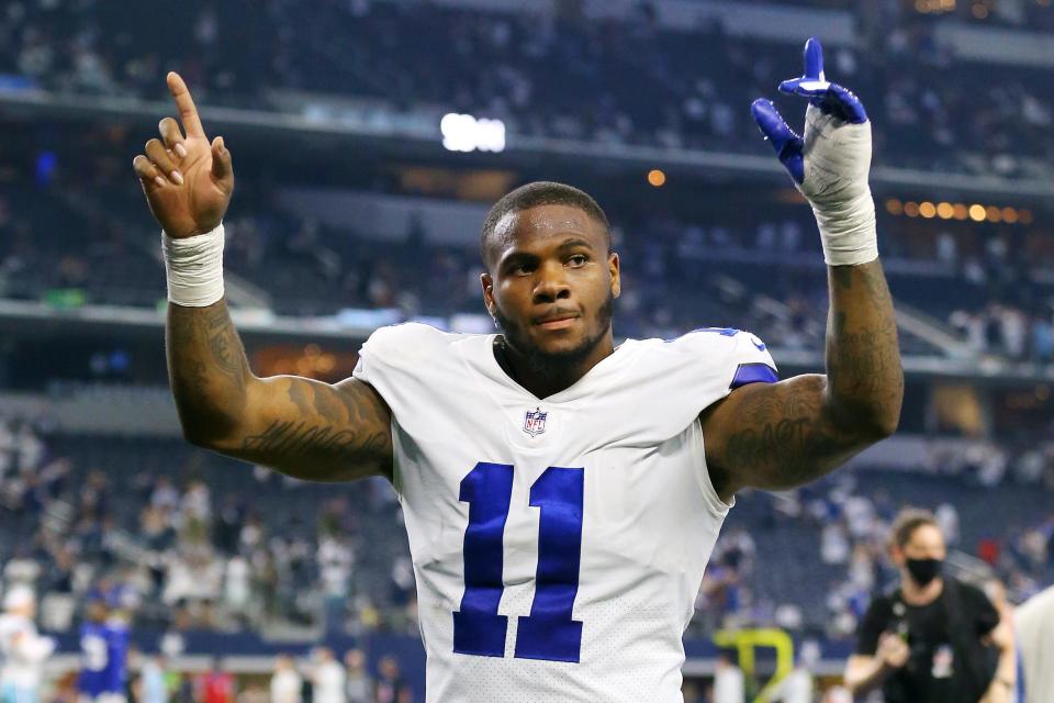 Micah Parsons #11 of the Dallas Cowboys celebrates after defeating the New York Giants at AT&T Stadium on October 10, 2021 in Arlington, Texas.