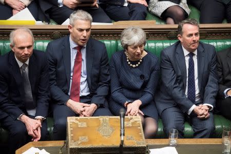 Britain's Prime Minister Theresa May reacts during the debate on extending Brexit negotiating period in Parliament in London, Britain, March 14, 2019. UK Parliament/Jessica Taylor/Handout via REUTERS