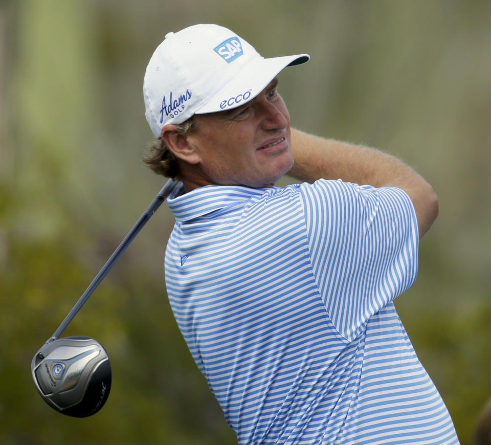 Ernie Els, of South Africa, watches his tee shot on the seventh hole in his match against Jason Dufner during the third round of the Match Play Championship golf tournament on Friday, Feb. 21, 2014, in Marana, Ariz. (AP Photo/Ted S. Warren)