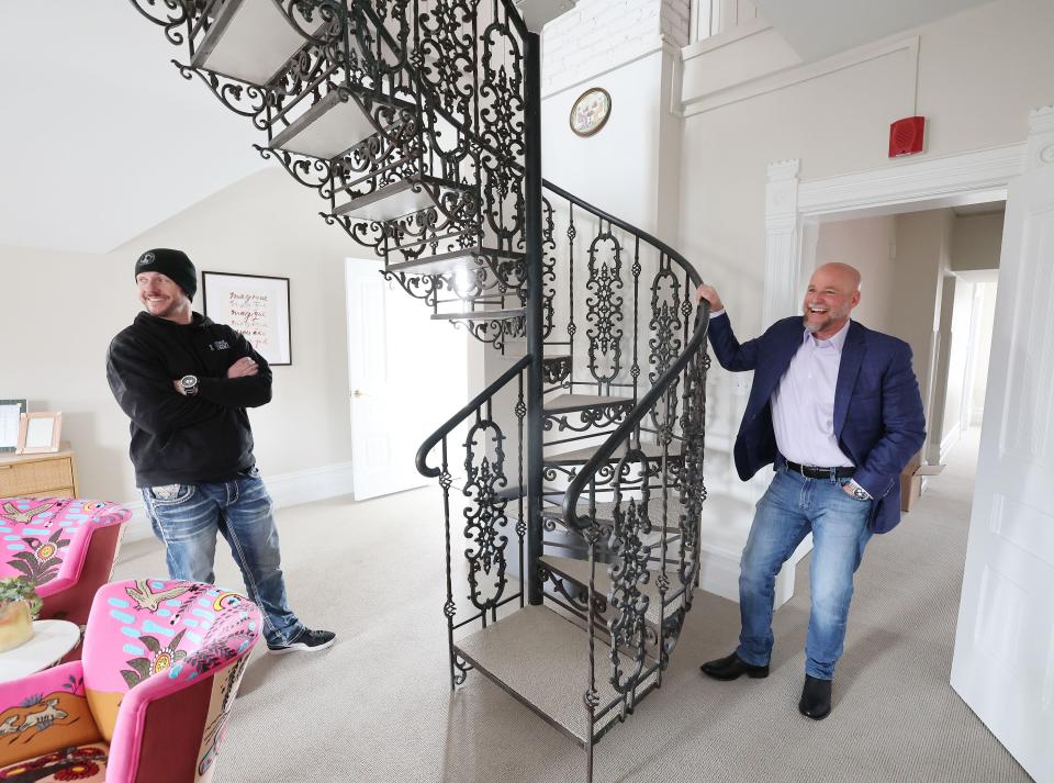 Dave Durocher, executive director of The Other Side Academy, right, talks with Jordan Holdaway, general manager of Other Side Academy Builders, during renovation of the Armstrong Mansion in Salt Lake City on Wednesday, March 29, 2023. The organization works with former prisoners hoping to rehabilitate their lives. | Jeffrey D. Allred, Deseret News