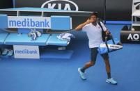 Tennis - Australian Open - Melbourne Park, Melbourne, Australia - 19/1/17 Serbia's Novak Djokovic gestures as he leaves the court after losing his Men's singles second round match against Uzbekistan's Denis Istomin. REUTERS/Jason Reed