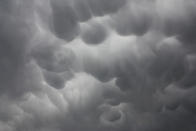 <a href="http://www.flickr.com/photos/blyzz/3449007613/" rel="nofollow noopener" target="_blank" data-ylk="slk:Mammatus Clouds;elm:context_link;itc:0;sec:content-canvas" class="link ">Mammatus Clouds</a>. Also known as mammatocumulus is a meteorological term applied to a cellular pattern of pouches hanging underneath the base of a cloud. The name "mammatus" is derived from the Latin mamma (udder). This photo was taken on April 17, 2009.
