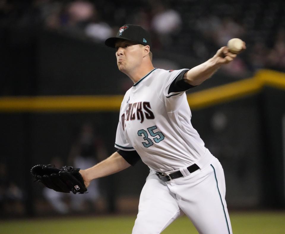 Jun 14, 2022; Phoenix, Ariz., U.S.; Arizona Diamondbacks relief pitcher Joe Mantiply (35) throws against the Cincinnati Reds during the ninth inning at Chase Field.