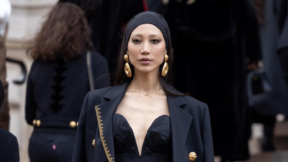 Soo Joo Park attends the Schiaparelli Haute Couture Spring/Summer 2024 in an all black outfit. 