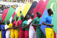 Performers line up during opening ceremony of the African Cup of Nations 2022 group A soccer match between Cameroon and Burkina Faso at the Olembe stadium in Yaounde, Cameroon, Sunday, Jan. 9, 2022. (AP Photo/Themba Hadebe)