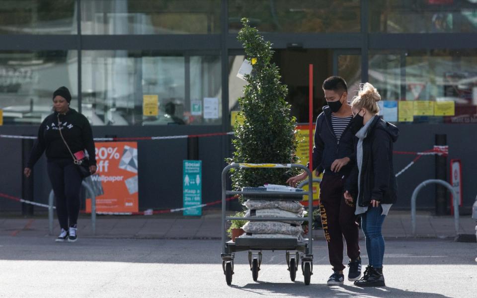 Shoppers stock up at a B&Q in London earlier today - Jamie Lorriman 