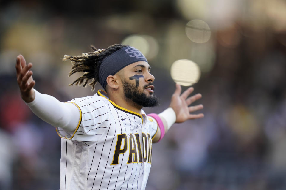 San Diego Padres' Fernando Tatis Jr. celebrates after the Padres defeated the San Francisco Giants in a baseball game Thursday, Sept. 23, 2021, in San Diego. (AP Photo/Gregory Bull)