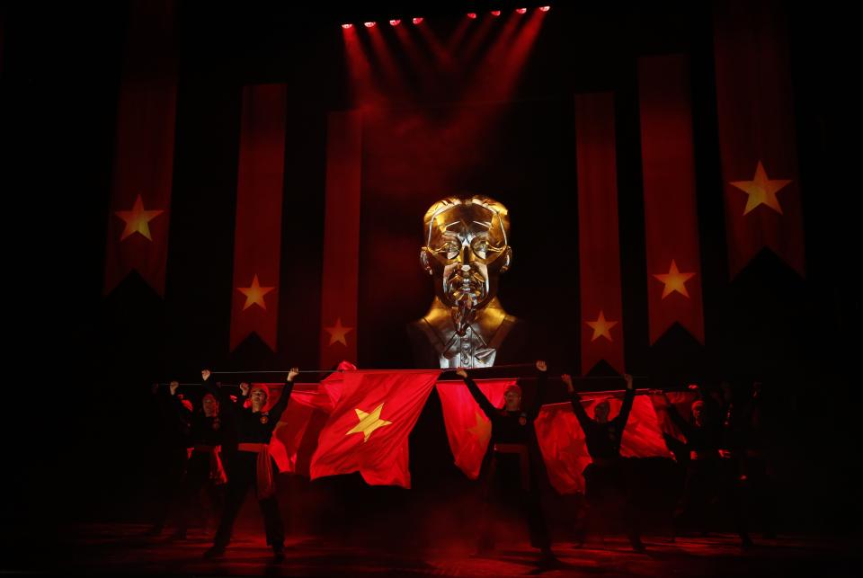 The cast performs during a photocall for a new production of "Miss Saigon" at the Prince Edward Theatre in London May 19, 2014. The production marks the 25th anniversary of the musical by Claude-Michel Schonberg and Alain Boubil. REUTERS/Luke MacGregor (BRITAIN - Tags: ENTERTAINMENT)