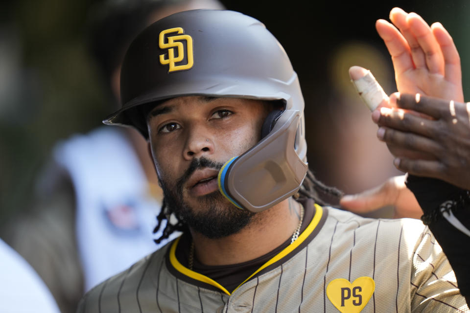 San Diego Padres' Luis Campusano celebrates after scoring on a single from Fernando Tatis Jr. during the fifth inning of a baseball game against the Chicago Cubs, Wednesday, May 8, 2024, in Chicago. (AP Photo/Erin Hooley)