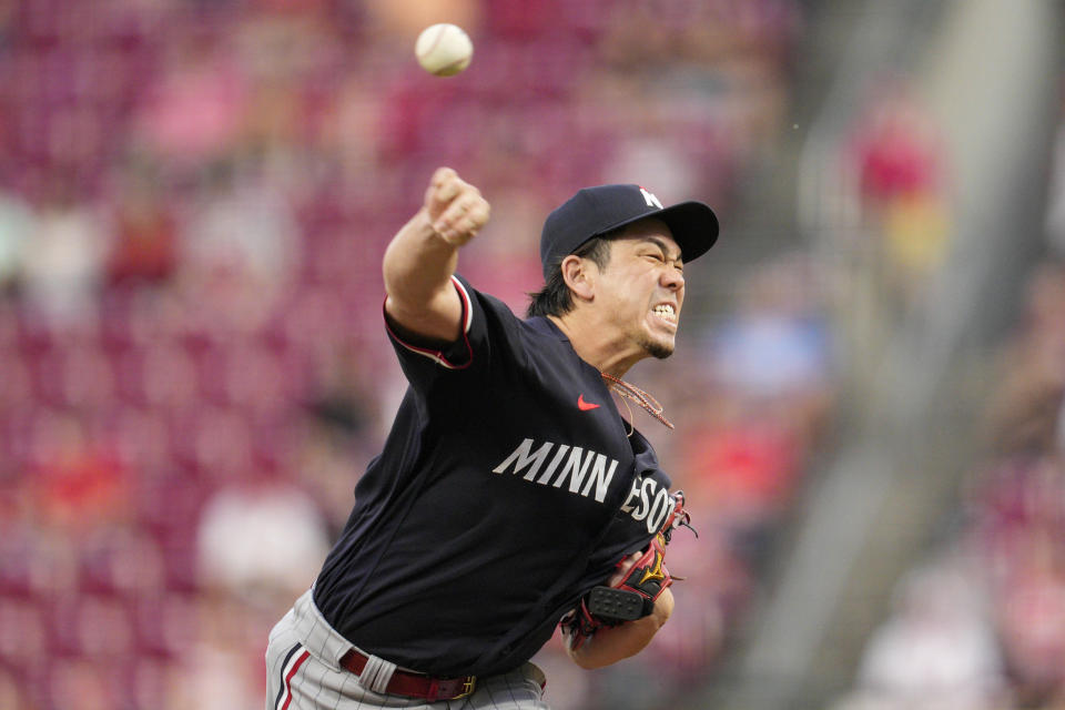 Minnesota Twins starting pitcher Kenta Maeda throws to a Cincinnati Reds batter during the second inning of a baseball game in Cincinnati, Tuesday, Sept. 19, 2023. (AP Photo/Jeff Dean)