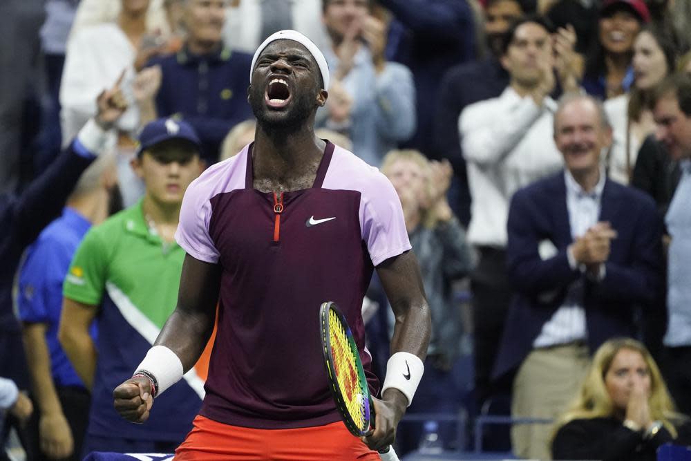 Frances Tiafoe, of the United States, reacts after winning the fourth set against Carlos Alcaraz, of Spain, during the semifinals of the U.S. Open tennis championships, Friday, Sept. 9, 2022, in New York. (AP Photo/John Minchillo)