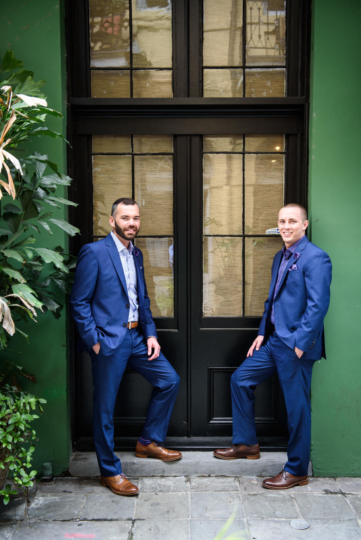 Eric Sheffield and Lane Ross married on Mardi Gras eve. (Photo: <a href="http://www.nolaweddingphotographer.com/" target="_blank">Michael Caswell Photography</a>)