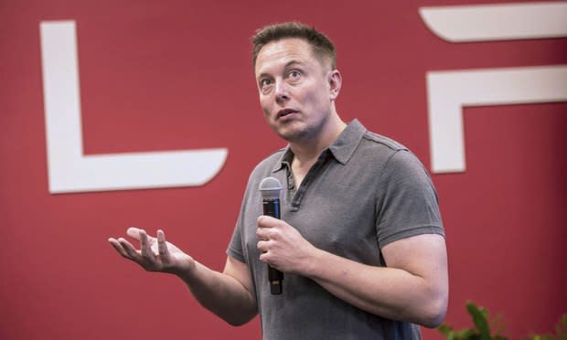 Elon Musk, chairman and chief executive officer of Tesla Motors, speaks during an event the company's headquarters in Palo Alto, California, U.S., on Wednesday, Oct. 14, 2015. Photo: David Paul Morris.