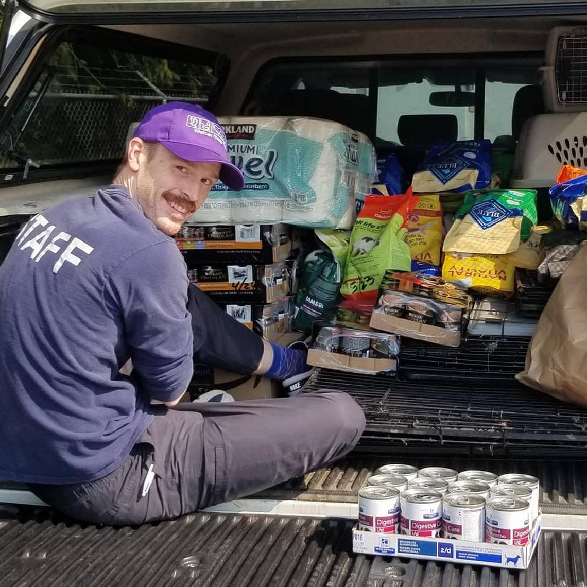 Whatcom Humane Society customer service staff member Mark Henry loads a truckload of supplies to take to the Humane Society of Skagit Valley after that organization seized more than 100 puppies from property near Sedro-Woolley on Sept. 2. Whatcom Humane Society/Courtesy to The Bellingham Herald