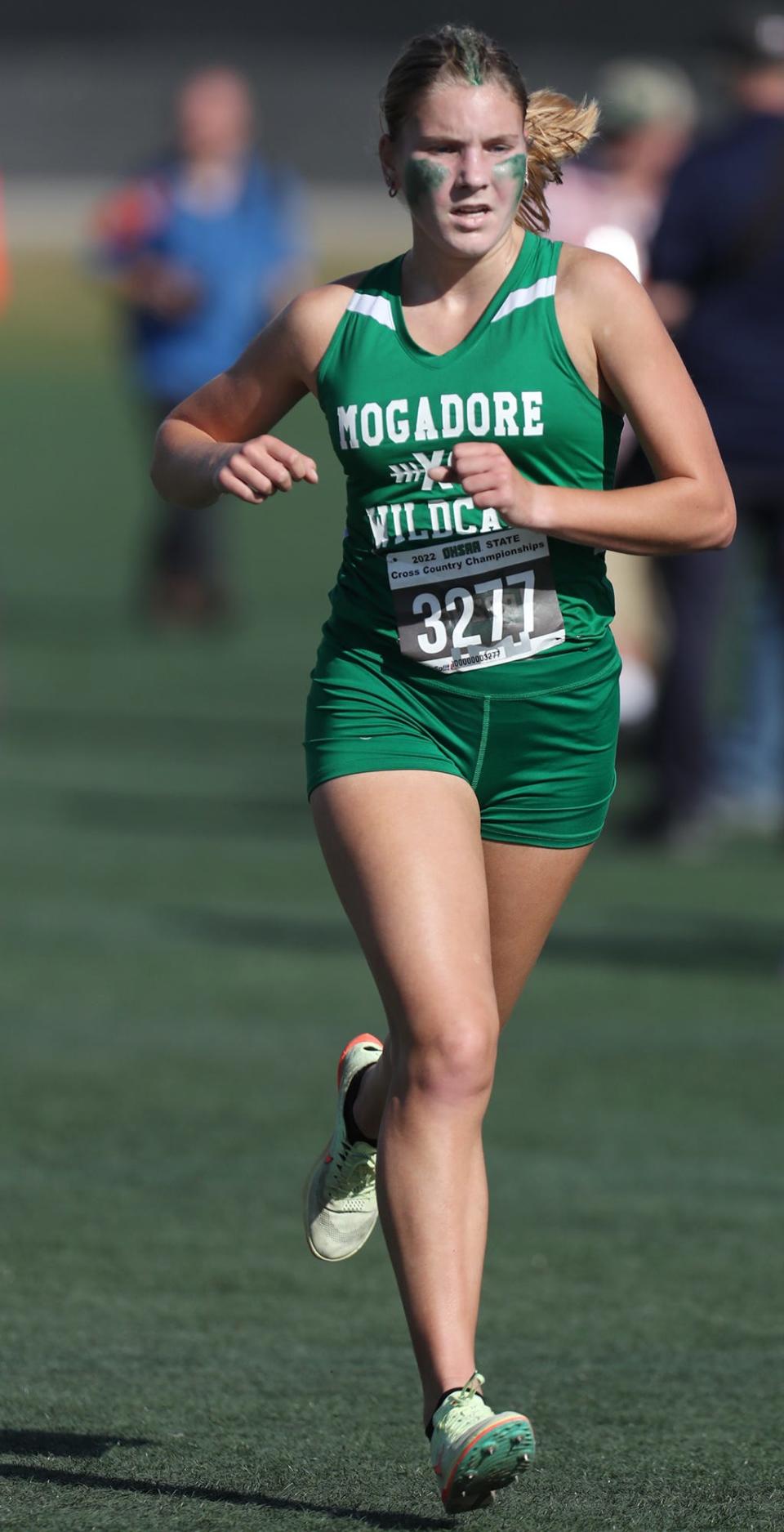 Mogadore's Mia Gaetjens heads to the finish line in the Girls Div III at the Cross Country State Championships at Fortress Obetz and Memorial Park on Saturday in Obetz..  [Mike Cardew/Akron Beacon Journal]  Photo taken on Monday, Nov. 1, 2022