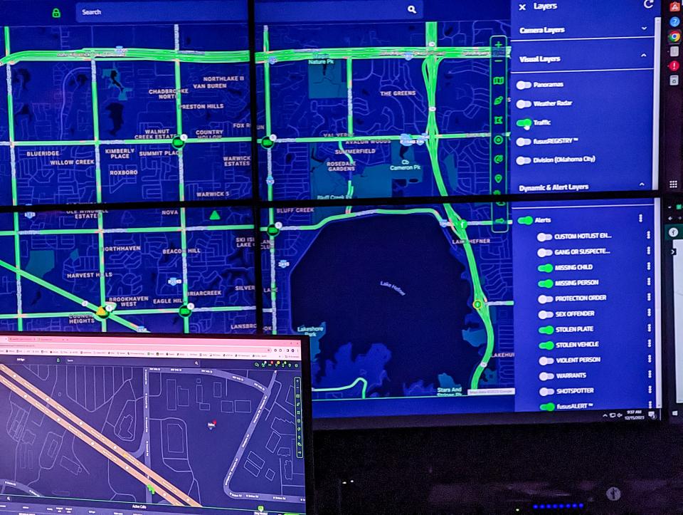 Police show the map overlay at work in the Oklahoma City Police Department's new Real Time Information Center in December 2023.