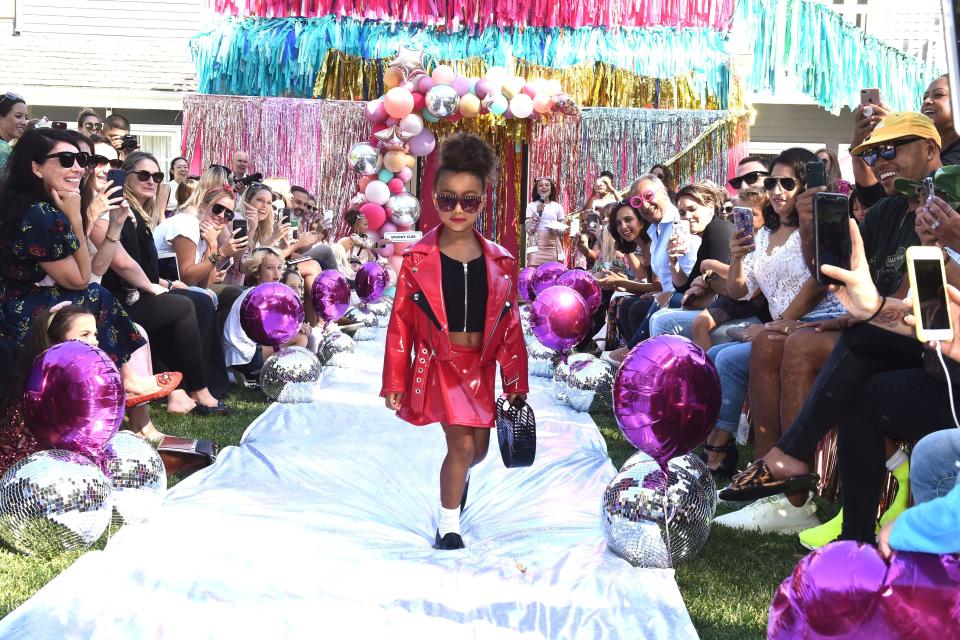 North West made her runway modeling debut at the L.O.L. Surprise fashion show in Los Angeles, and of course proud mom Kim Kardashian was front row.