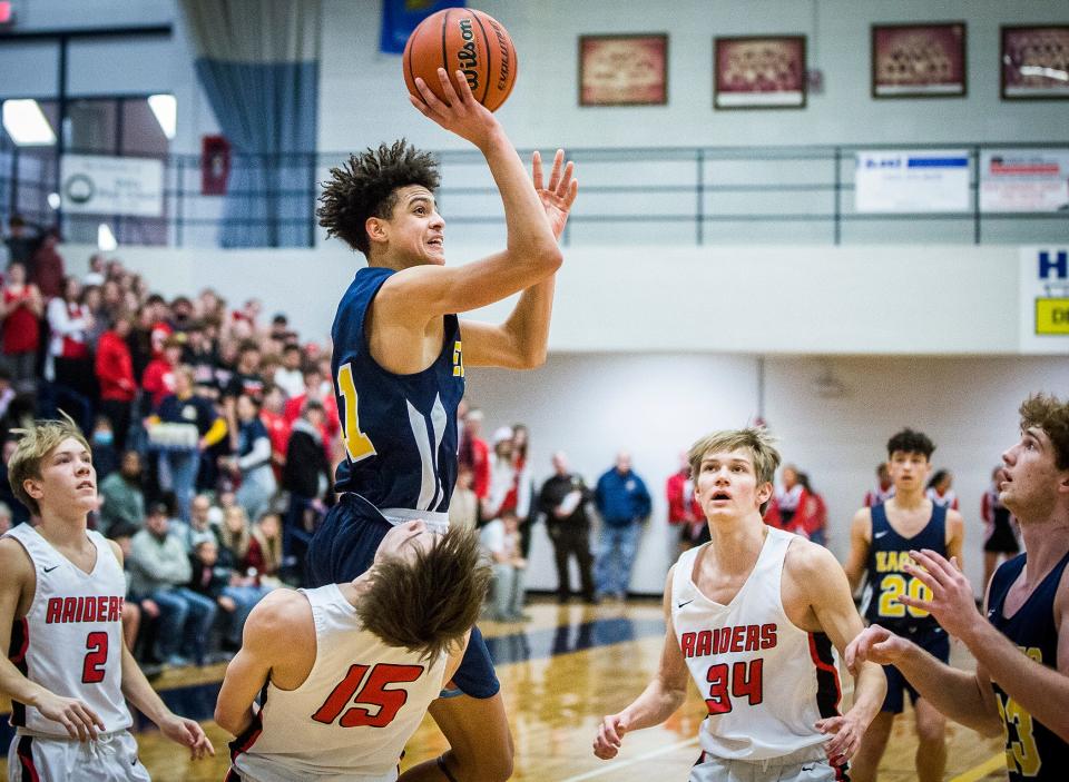 Delta's D'Amare Hood shoots against Wapahani during their championship game at Delta High School Saturday, Jan. 15, 2022.